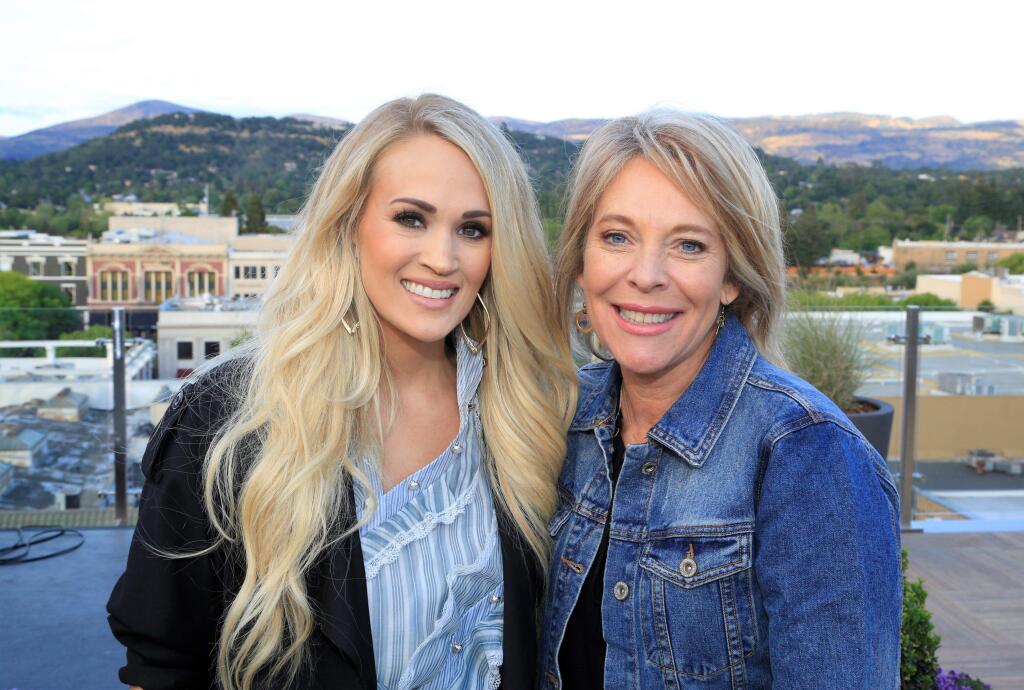 Carrie Underwood poses for a photo with founder of Live in the Vineyard Goes Country Bobbii Hach Jacobs prior to Underwood's performance at the Jam Cellars Ballroom in Napa on Wednesday, May 16, 2018. (WILL BUCQUOY/ LIVE IN THE VINEYARD)
