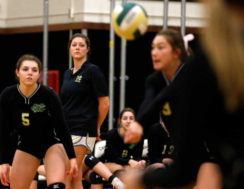 Maria Carrillo varsity volleyball coach Ally Deal, second from left, watches the action from the sideline during a varsity volleyball match between Maria Carrillo and Casa Grande high schools in Petaluma on Tuesday, Oct. 24, 2017. (Alvin Jornada / The Press Democrat)