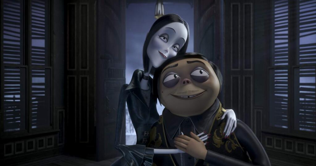 Gomez Addams (voice of Oscar Isaac) and Morticia Addams (Charlize Theron) in the animated version of the comic strip by Charles Addams that was made into a 1960s TV show about the family's lives beginning to unravel when they move to New Jersey and face-off against the 21st century and its greedy, arrogant and sly reality TV host Margaux Needler while also preparing for their extended family to arrive for a major celebration. (United Artists Releasing)