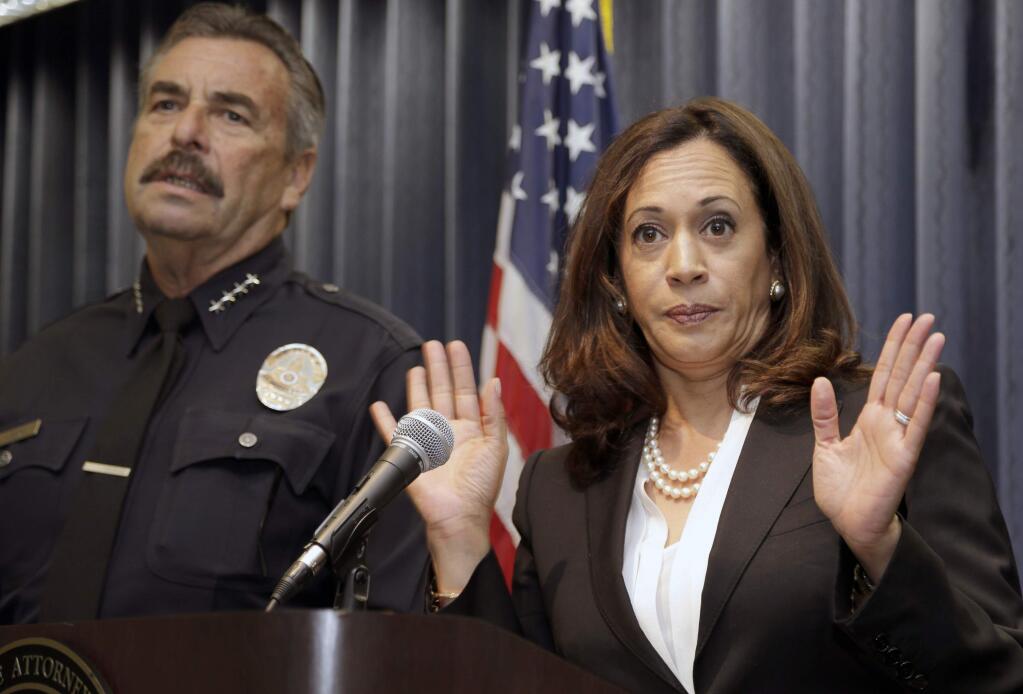 Attorney General Kamala Harris and Los Angeles Police Chief Charlie Beck announcing the launch of Open Justice, a criminal justice database maintained by the state Department of Justice. (NICK UT / Associated Press, 2015)