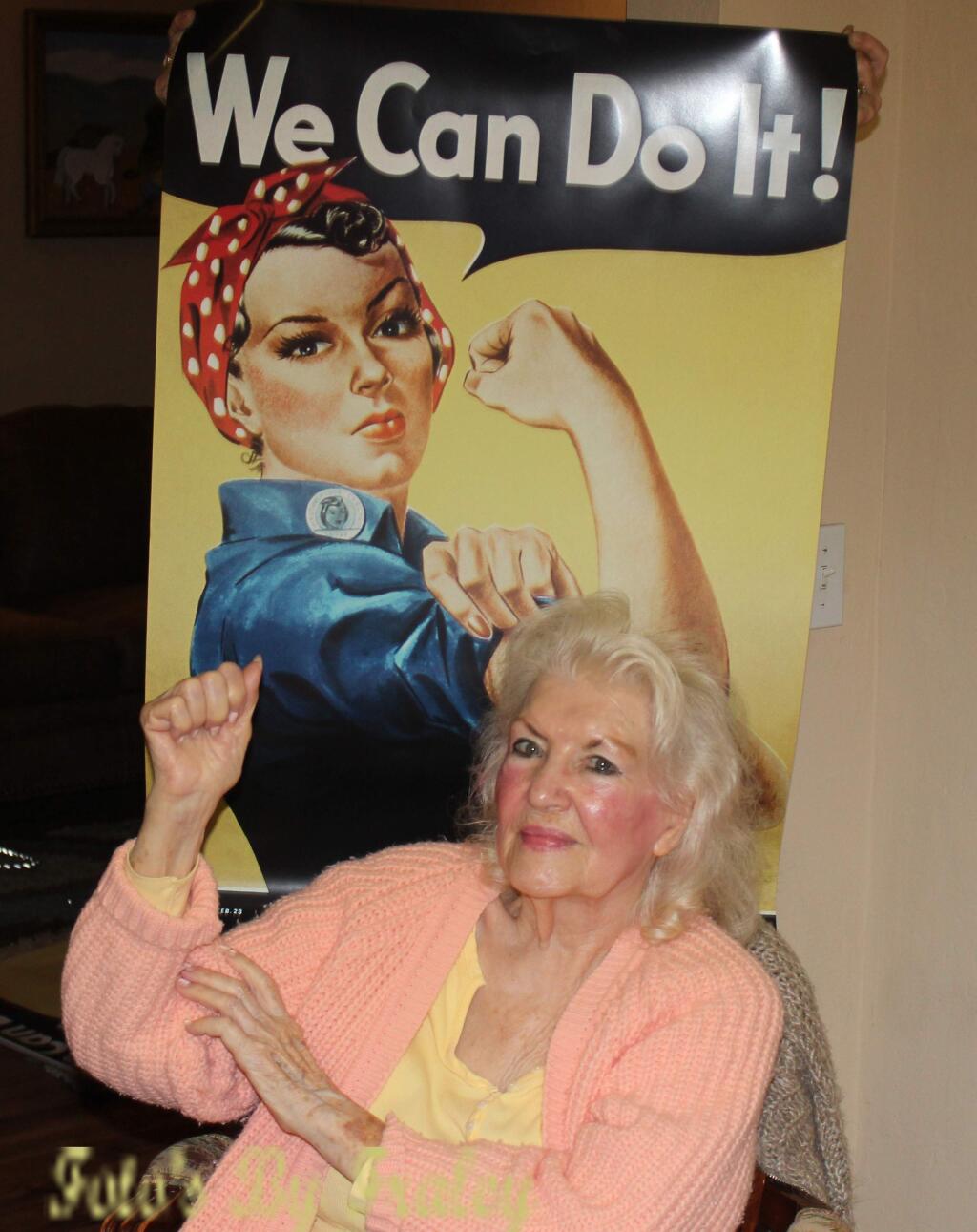 In a photo provided by John D. Fraley, Naomi Parker Fraley in 2015 with the Rosie the Riveter poster that became a feminist touchstone. Fraley, who died on Jan. 20, 2018, at age 96 in Longview, Wash., went unsung for seven decades before being identified as the real Rosie the Riveter – the female war worker of 1940s popular culture who became a feminist touchstone in the late 20th century. (John D. Fraley via The New York Times) -- NO SALES; FOR EDITORIAL USE ONLY WITH NYT STORY OBIT FRALEY BY MARGALIT FOX FOR JAN. 22, 2018. ALL OTHER USE PROHIBITED. --