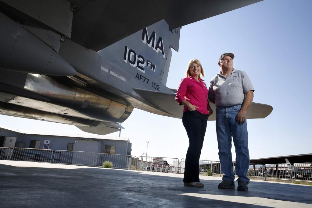 PHOTO: 1 by BETH SCHLANKER / The Press DemocratChristina Olds, the director of museum operations at the Pacific Coast Air ?Museum, left, and Lynn Hunt, president of the board of directors, pause next to a retired Massachusetts Air National Guard F-15, which was the first military plane to respond to the 9/11 attack at the World Trade Center, at the Pacific Coast Air Museum in Santa Rosa.