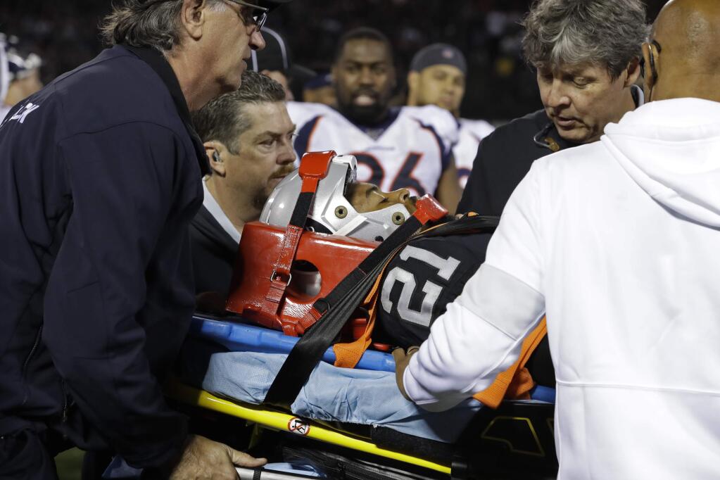 Oakland Raiders cornerback Gareon Conley leaves the game on a stretcher after an injury during the second half against the Denver Broncos Monday, Sept. 9, 2019, in Oakland. (AP Photo/Ben Margot)