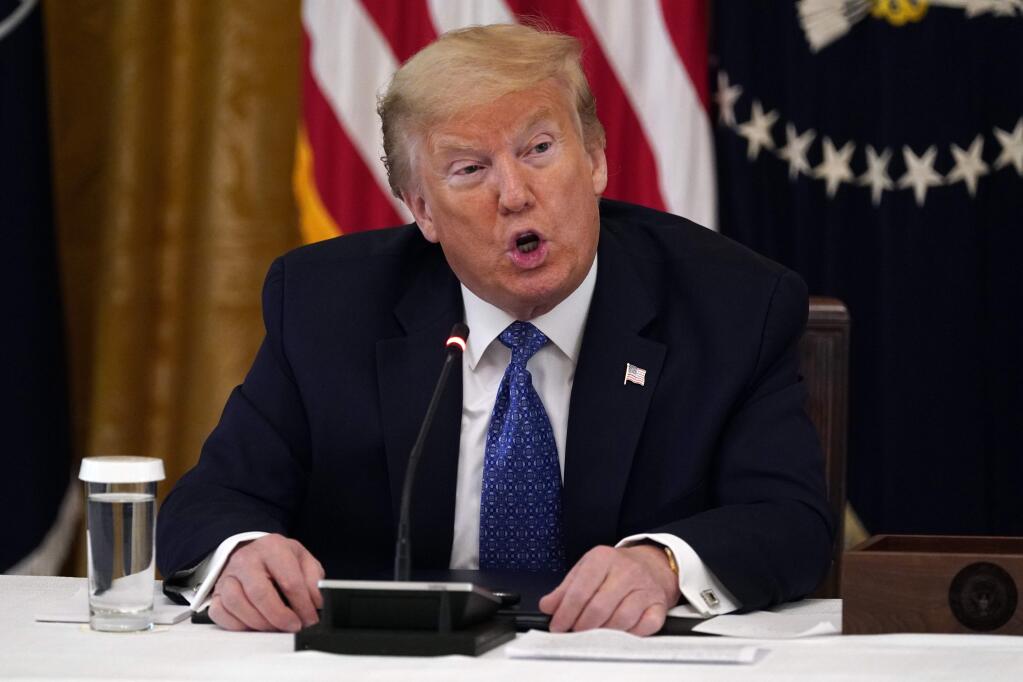 President Donald Trump speaks during a Cabinet Meeting in the East Room of the White House, Tuesday, May 19, 2020, in Washington. (AP Photo/Evan Vucci)