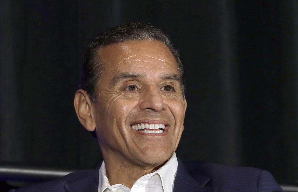 FILE - In this Mach 8, 2018 file photo, California gubernatorial candidate, former Los Angeles Mayor Antonio Villaraigosa, discusses the state's housing problems at a conference in Sacramento, Calif. Villaraigosa, a Democrat, is one of six candidates running to replace Gov. Jerry Brown. (AP Photo/Rich Pedroncelli, file)