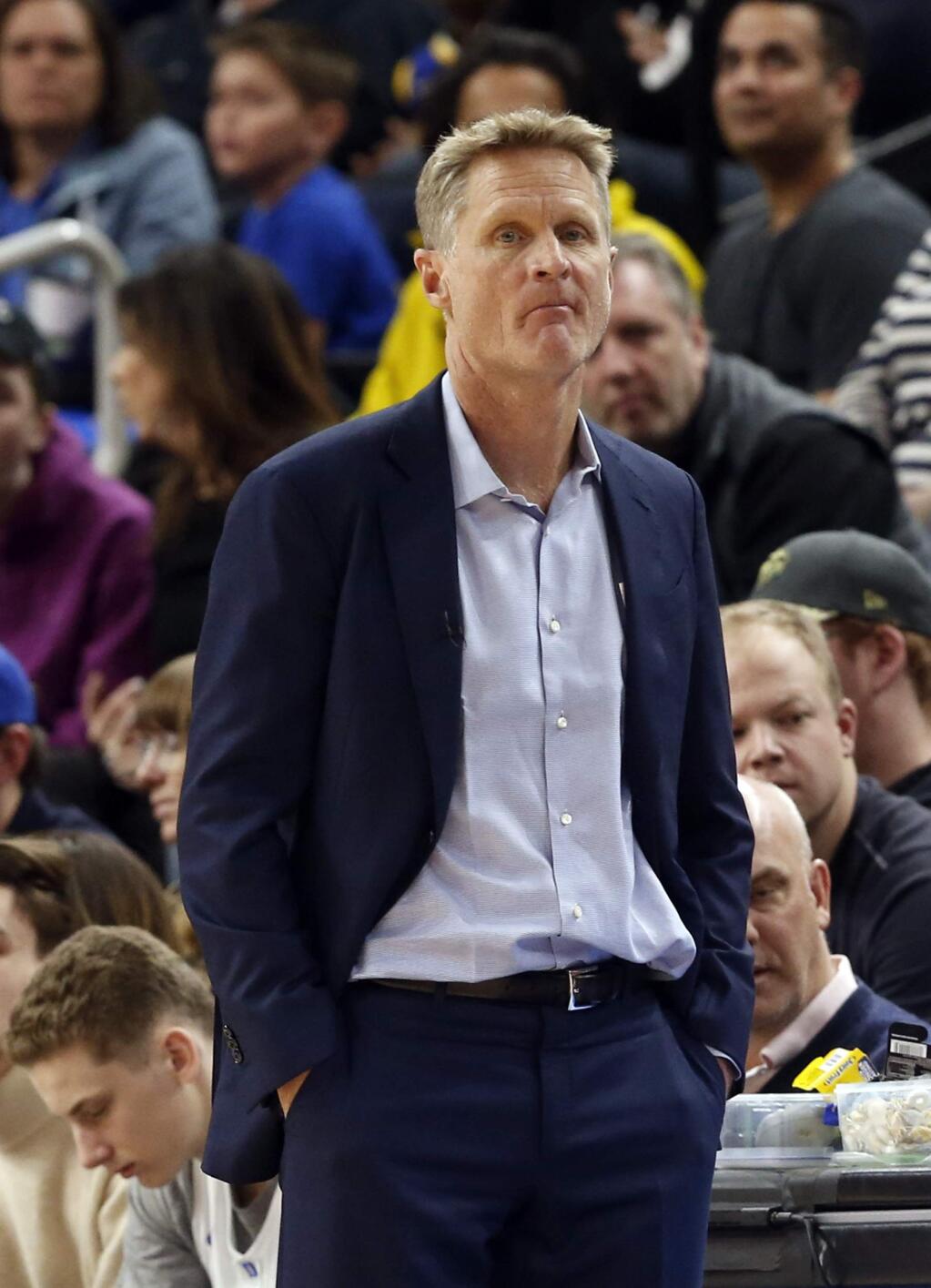 Golden State Warriors' head coach Steve Kerr watches his players in the second half of an NBA basketball game against the Minnesota Timberwolves Sunday, March 11, 2018, in Minneapolis. The Timberwolves won 109-103. (AP Photo/Jim Mone)
