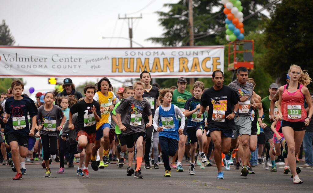 The front of the pack at the start of the Human Race, Sonoma County; a 3K and 10K run and walk that began at Herbert Slater Middle School and made its way through Howarth and Spring Lake parks in Santa Rosa Saturday morning. May 7, 2016. (Photo: Erik Castro/for The Press Democrat)
