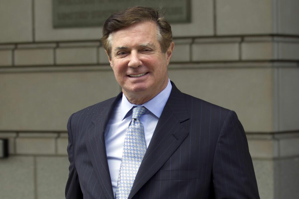 FILE - In this May 23, 2018, file photo, Paul Manafort, President Donald Trump's former campaign chairman, leaves the Federal District Court after a hearing, in Washington. Special counsel Robert Mueller is accusing Manafort of lying to federal investigators in the Russia probe in breach of his plea agreement. Prosecutors say in a new court filing that after Manafort agreed to truthfully cooperate with the investigation, he “committed federal crimes” by lying about “a variety of subject matters.” (AP Photo/Jose Luis Magana, File)