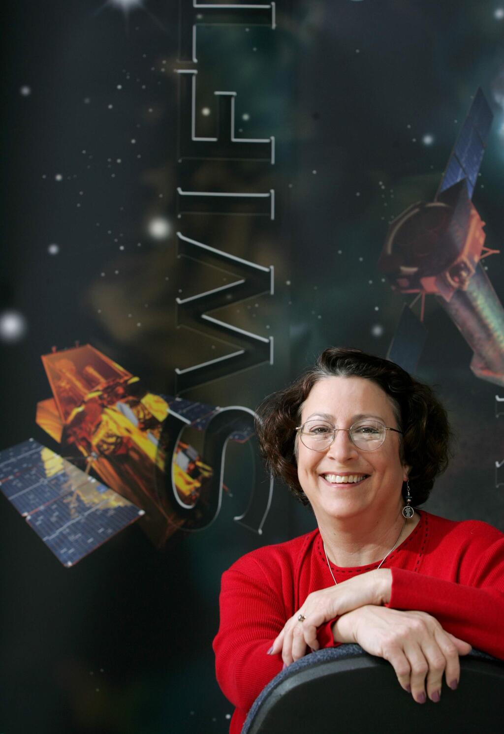 4/17/2005: D1: Sonoma State University professor Lynn Cominsky is an MIT-trained astrophysicist and a NASA adviser. She is program director for a NASA program that aims to explain the science of the universe to students, particularly in connection with the gamma-ray detecting Swift satellite, launched last year.PC: Photo by Christopher Chung/ The Press Democrat SSU Professor Lynn Cominsky is the program director for NASA's Edication Public Outreach program.