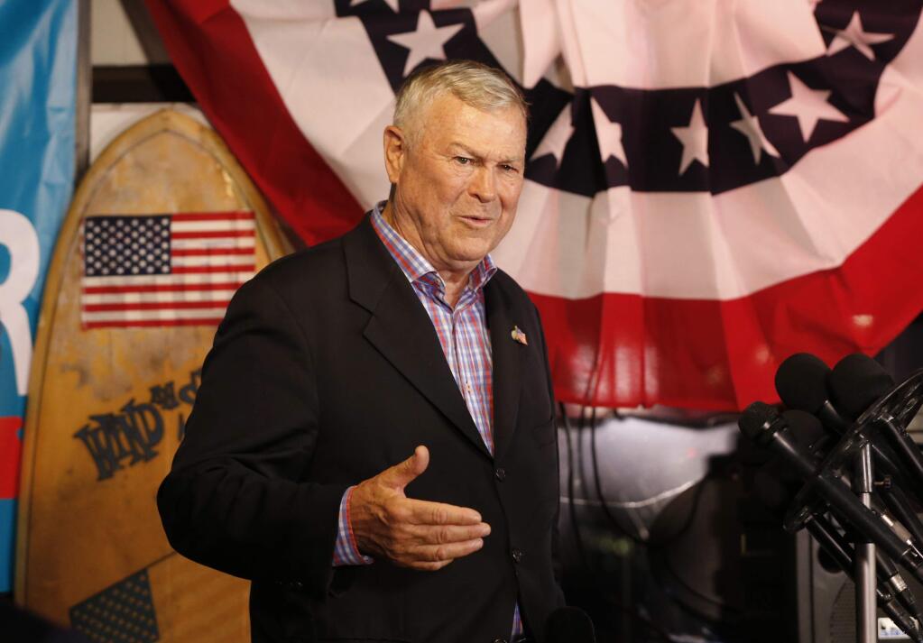 U.S. Rep. Dana Rohrabacher, R-Costa Mesa, addresses members of the media and supporters waiting for election results at the Skosh Monahan's Irish Pub in Costa Mesa, Calif., Tuesday, Nov. 6, 2018. Rohrabacher's opponent is Democrat Harley Rouda in Orange County's 48th District. (AP Photo/Damian Dovarganes)