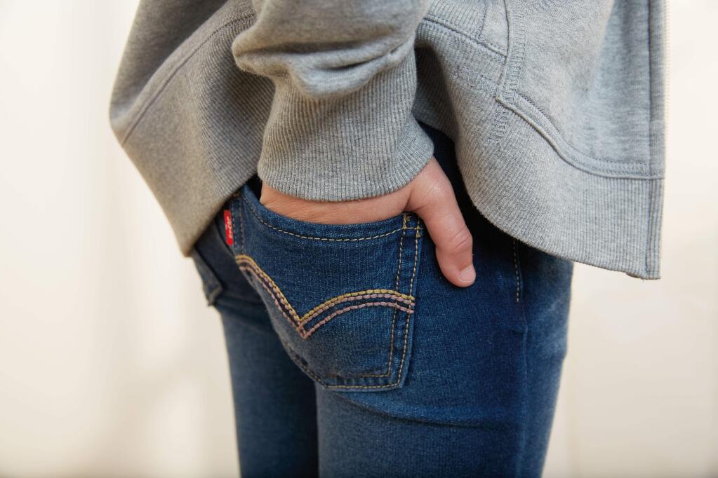 This product image provided by Levi Strauss shows the company's Knit Jeans, made of stretch cotton knit that look like jeans but feel like sweatpants. Companies, including Levi Strauss, which invented the first pair of blue jeans 141 years ago, acknowledge that the jeans business has been hurt by what the fashion industry dubs the ìathleisureî trend. That has led them to create new versions of classic denim that are more ìstretchyî and mimic the comfort of sweatpants. (AP Photo/Levi Strauss)