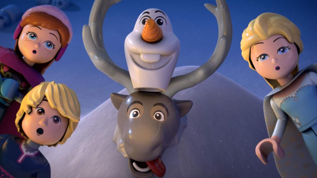 This image released by Disney shows Lego characters based on the animated film, 'Frozen.' Disney is letting 'Frozen' go in new directions. The company says Anna, Elsa, Olaf, Kristoff and Sven from the blockbuster 2013 animated film will appear in both new books from Random House and an animated short film series from the Lego Group. (Disney via AP)