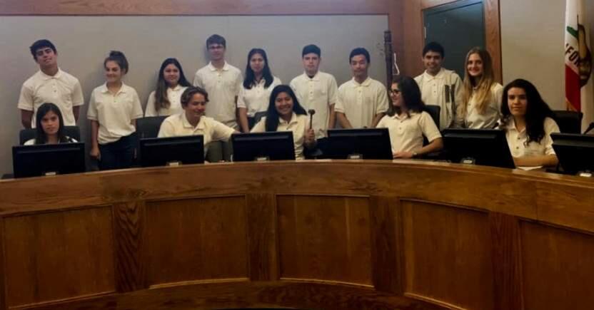 Participants in this year's Youth Engagement Seminar behind the dais at Sonoma City Council Chambers.
