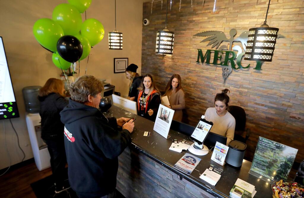 Customers arrive on the first day of legal recreational marijuana sales in Sonoma County at Mercy Wellness of Cotati, on the morning of Monday, January 1, 2018. (photo by John Burgess/The Press Democrat)