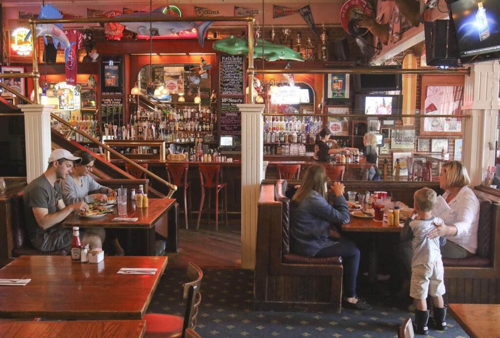 The dining room at McNear's Saloon & Dining House on Monday June 1, 2015. (SCOTT MANCHESTER/ARGUS-COURIER STAFF)
