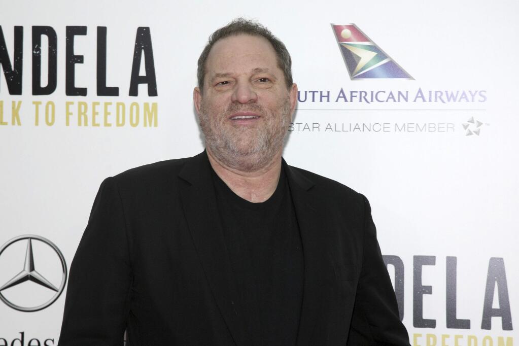 FILE - In this Nov. 14, 2013 file photo, producer Harvey Weinstein attends the New York premiere of 'Mandela: Long Walk To Freedom' in New York. (Photo by Andy Kropa/Invision/AP, File)