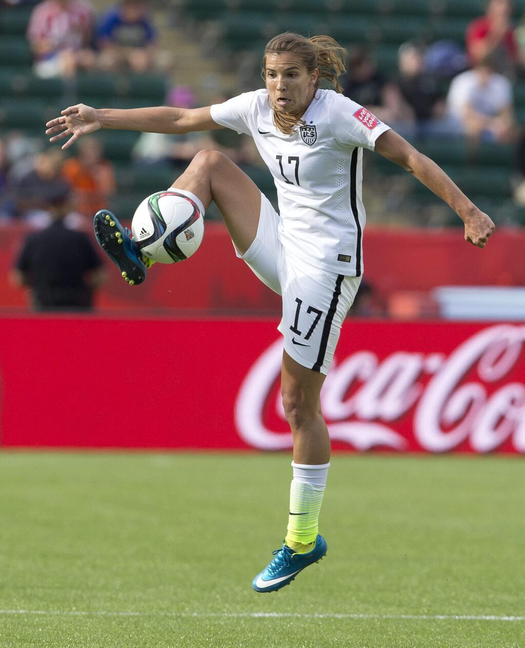 United States' Tobin Heath (17) kicks the ball against Colombia during first half FIFA Women's World Cup round of 16 action in Edmonton, Alberta, Canada, Monday, June 22, 2015. (Jason Franson/The Canadian Press via AP)
