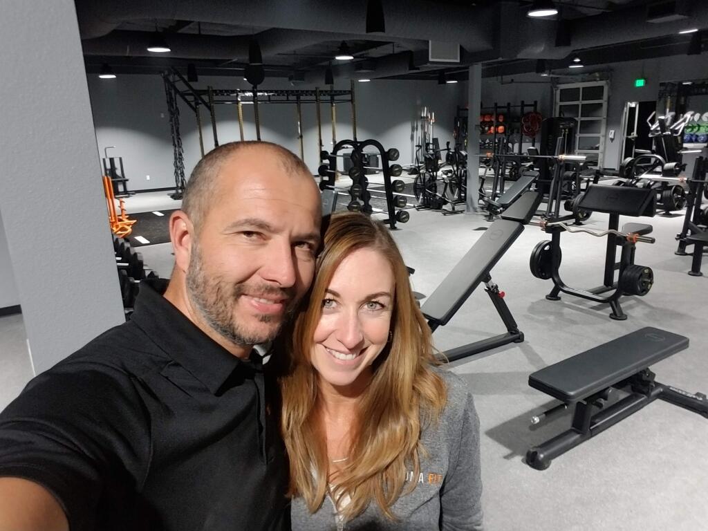 The Kovacs taking a selfie at their new Sonoma Fit Petaluma location.