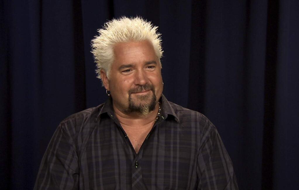 This Oct. 11, 2016 image taken from video shows celebrity chef Guy Fieri during an interview in New York. (Bruce Barton/AP)