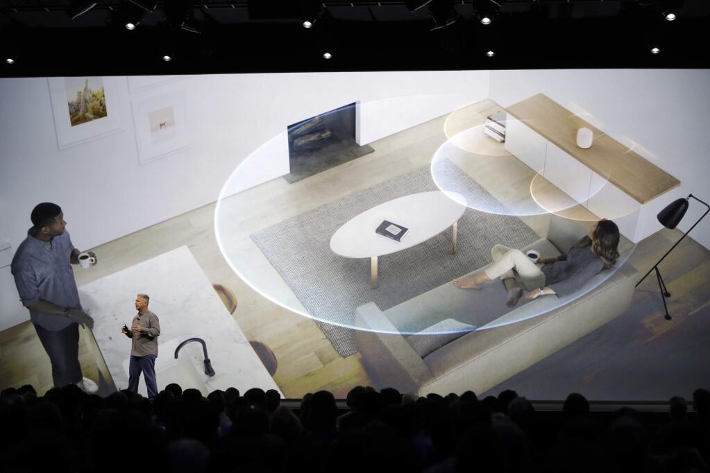 FILE - In this Monday, June 5, 2017, file photo, Phil Schiller, Apple's senior vice president of worldwide marketing, introduces the HomePod speaker at the Apple Worldwide Developers Conference in San Jose , Calif. Pre-orders for the HomePod will begin Friday, Jan. 26, 2018, in the U.S, U.K. and Australia, two weeks before the speaker goes on sale in stores. (AP Photo/Marcio Jose Sanchez, File)