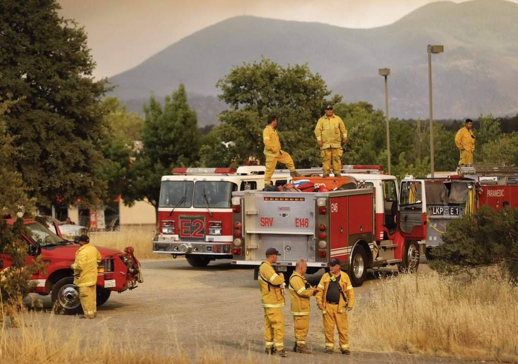 Firefighters stage in Lakeport to fight the Mendocino Complex fires on Sunday, July 29, 2018. (BETH SCHLANKER/Press Democrat)