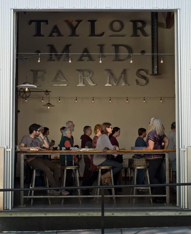 Customers inside Taylor Maid Farms coffee shop during the Barlow Street Fair in Sebastopol in 2013. (ALVIN JORNADA/ PD FILE)