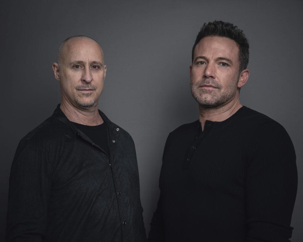 In this Feb. 22, 2020 photo, director Gavin O'Connor, left, and actor Ben Affleck pose for a portrait in New York to promote their film 'The Way Back.' (Photo by Christopher Smith/Invision/AP)