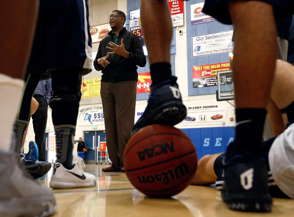 Former NBA center and coach Bill Cartwright, who played on the Chicago Bulls' three-time championship-winning teams in 1991, 1992, and 1993, talks to the Sonoma State University men's and women's basketball teams on Thursday, Feb. 16, 2017. (Alvin Jornada / The Press Democrat)