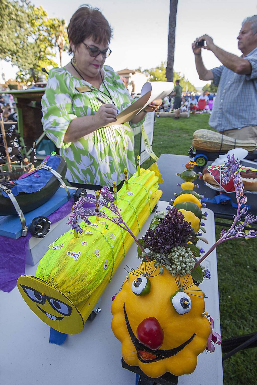The annual, much-anticipated zucchini races were held at Tuesday's farmers market on Sonoma Plaza. Before the races began, the participating zukes were on display, much to the delight of the event's spectators. (Photos by Robbi Pengelly/Index-Tribune)