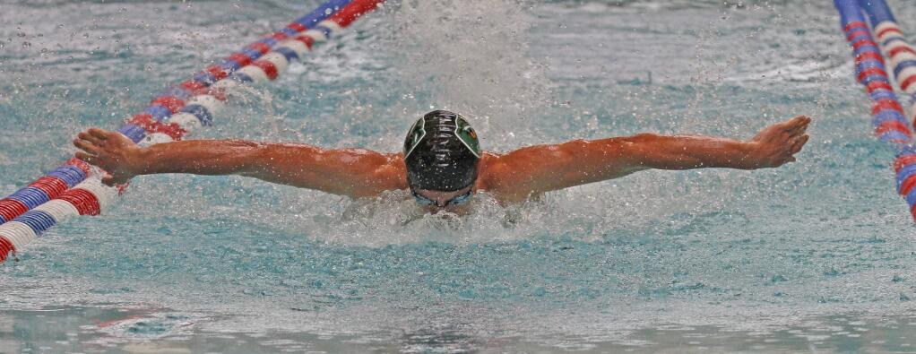 Sonoma's Dominic Tommasi competes in the butterfly during an SCL meet in April. Tommasi now competes in water polo for SRJC. (Bill Hoban/Index-Tribune)