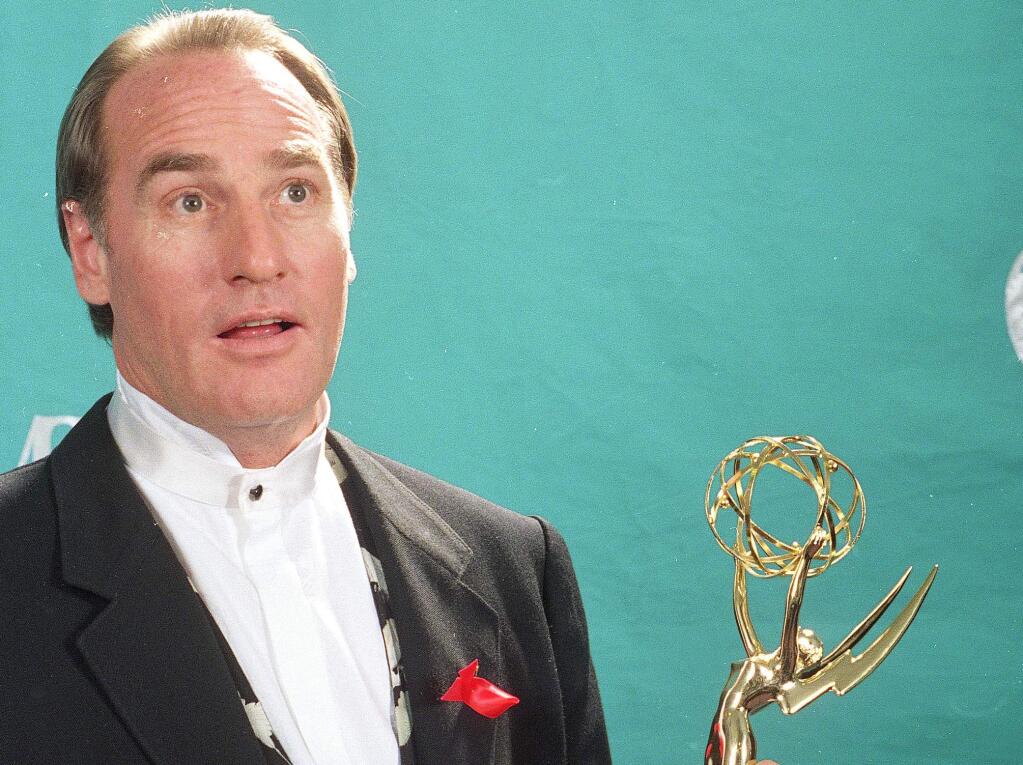 Actor Craig T. Nelson holds up his Emmy statuette at the 44th Annual Primetime Emmy Awards in Pasadena, Calif., in this Aug. 31, 1992 file photo. (AP Photo/Douglas C. Pizac, File)