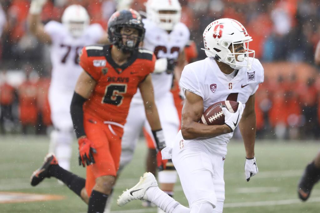 Stanford wide receiver Michael Wilson, foreground, scores a touchdown off a pass from quarterback Davis Mills during the first half against Oregon State in Corvallis, Ore., Friday, Sept. 28, 2019. (AP Photo/Amanda Loman)