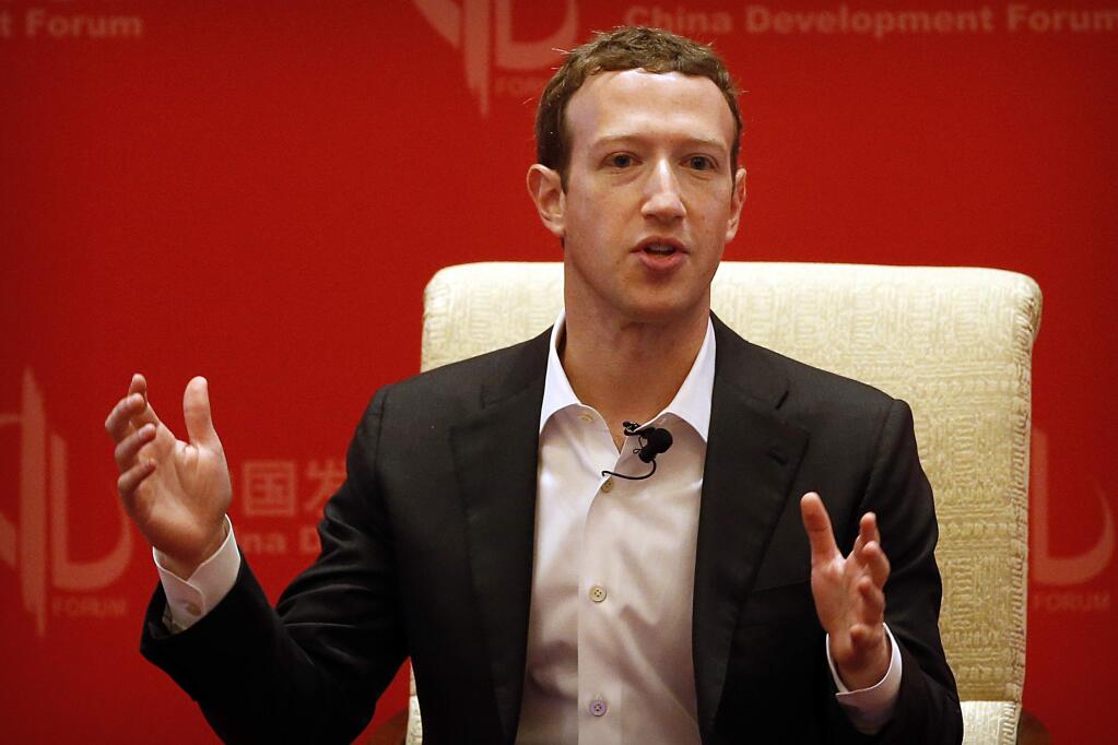 FILE - In this Saturday, March 19, 2016, file photo, Facebook CEO Mark Zuckerberg speaks during a panel discussion held as part of the China Development Forum at the Diaoyutai State Guesthouse in Beijing. Zuckerberg released a missive Thursday, Feb. 16, 2017, outlining his vision for the social network and the world at large. Among other things, Zuckerberg hopes that the social network can encourage more civic engagement, an informed public and community support in the years to come. (AP Photo/Mark Schiefelbein, File)