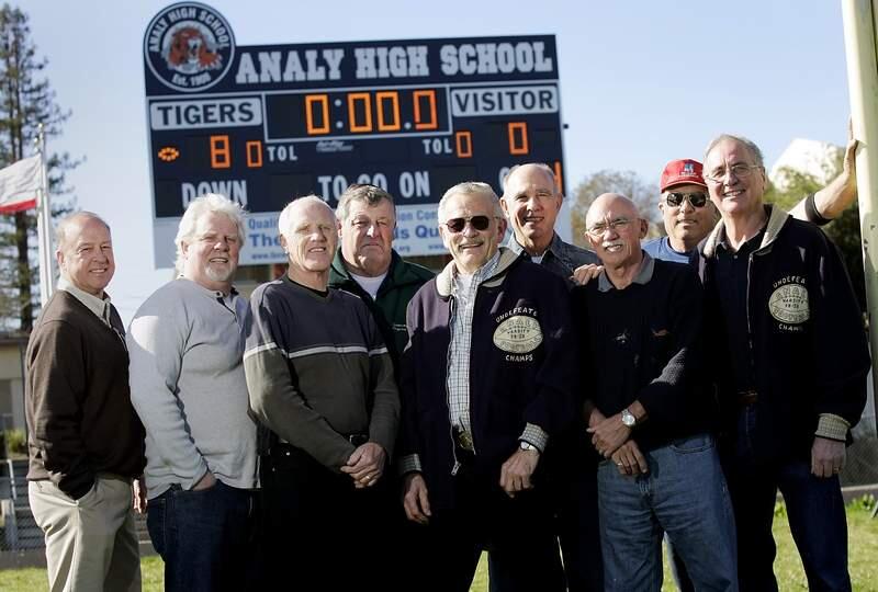 Terry Walker, left, Dick Blank, Gary Nelson, John Condon, Emil Alberigi, Don Freeman, Chan Castleberry, Dave Cook, and Louis Sanchietti were teammates on the undefeated (8-0) 1958-59 Analy High School football team.(Press Democrat/ Christopher Chung)