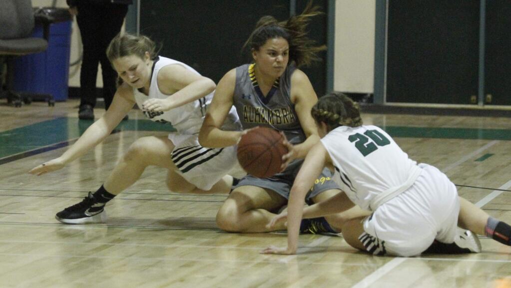 Bill Hoban/Index-TribuneSonoma's Annie Neles, left, and Alanna Johnston both dive in hopes of grabbing a loose ball during the Tuesday, Feb. 21, North Coast Section tournament game.