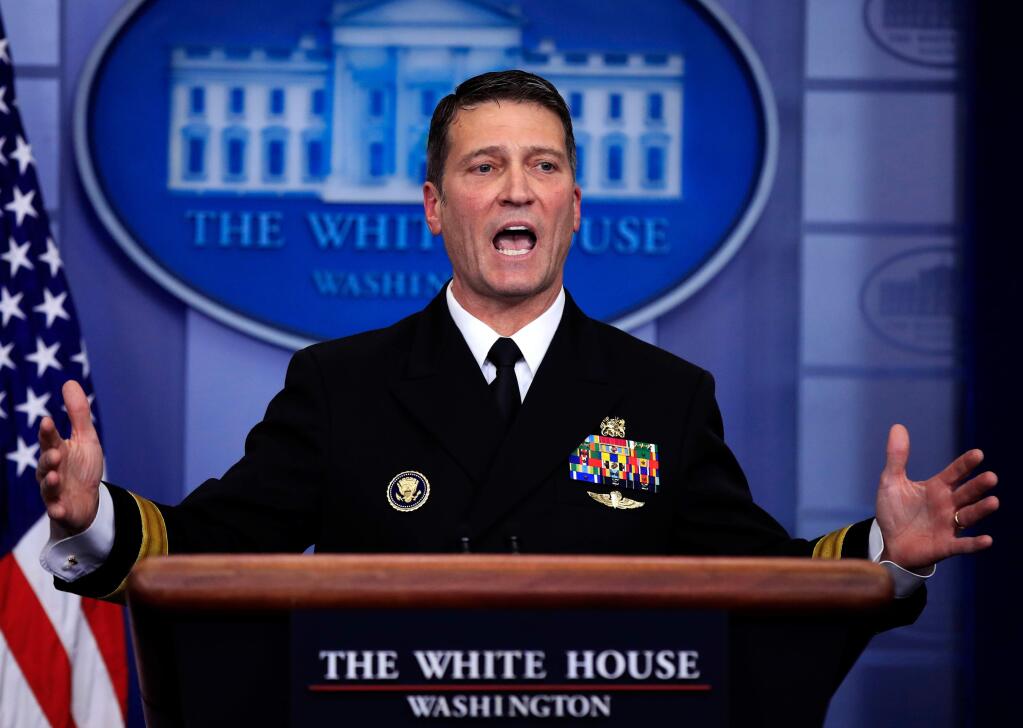FILE - In this Jan. 16, 2018, file photo, White House physician Dr. Ronny Jackson speaks to reporters during the daily press briefing in the Brady press briefing room at the White House, in Washington. Now it's Washington's turn to examine Jackson. The doctor to Presidents George W. Bush, Barack Obama and now Donald Trump is an Iraq War veteran nominated to head the Department of Veterans Affairs. (AP Photo/Manuel Balce Ceneta, File)