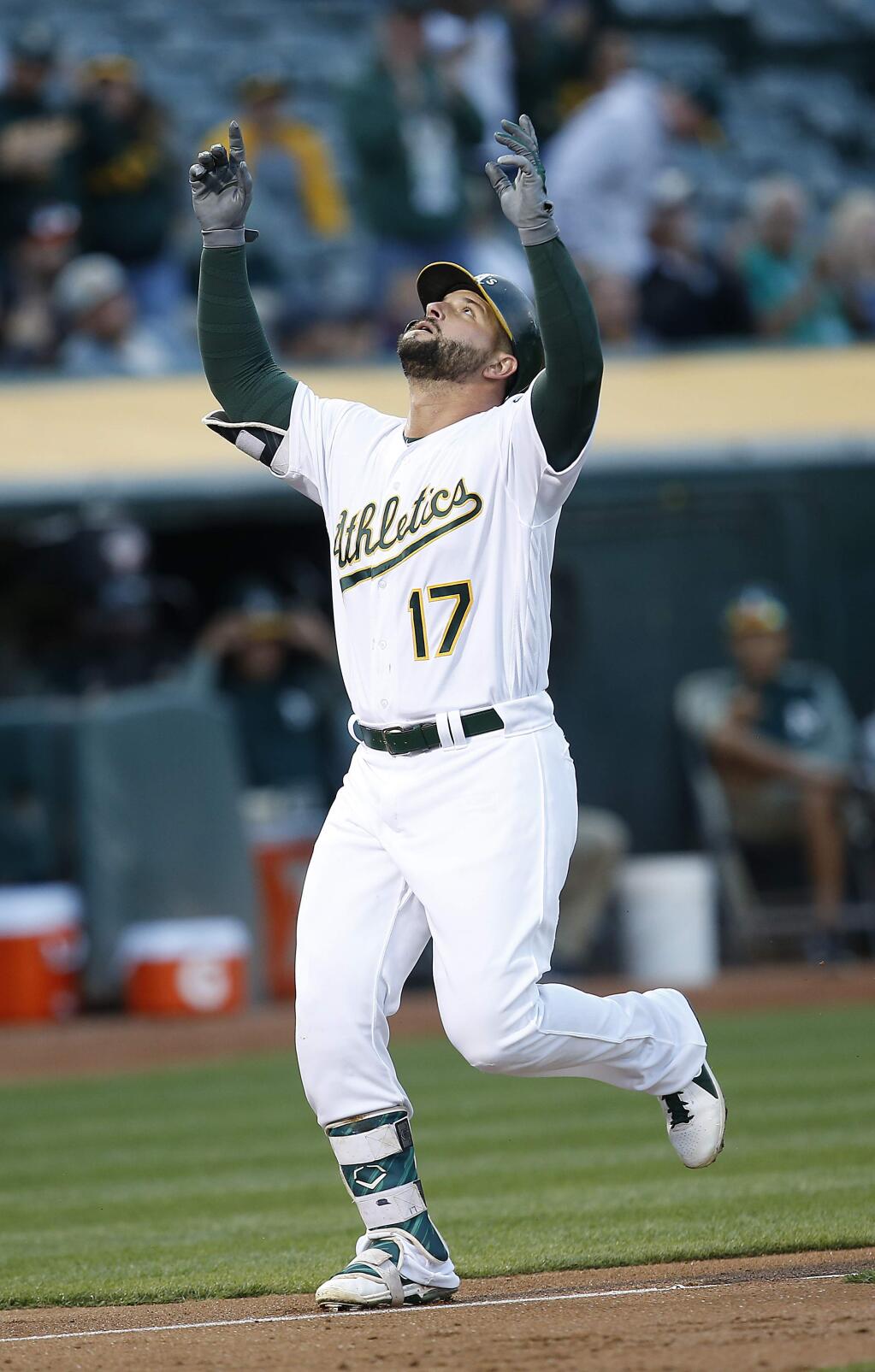 Oakland Athletics' Yonder Alonso celebrates as he crosses home plate after hitting a solo home run against the Miami Marlins during the second inning on Tuesday, May 23, 2017 in Oakland. (AP Photo/Tony Avelar)