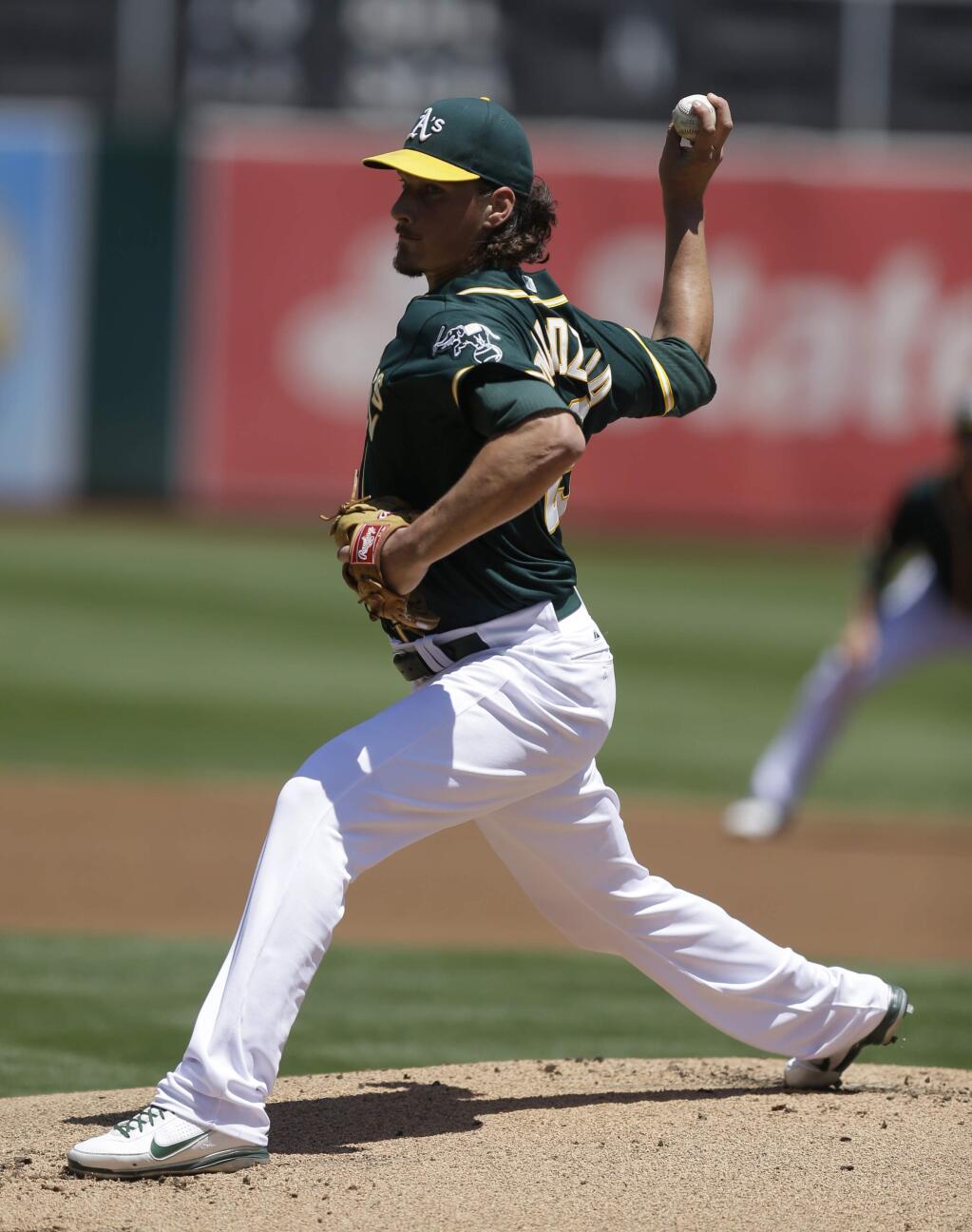 Oakland Athletics' Jeff Samardzija works against the Houston Astros in the first inning of a baseball game Thursday, July 24, 2014, in Oakland, Calif. (AP Photo/Ben Margot)