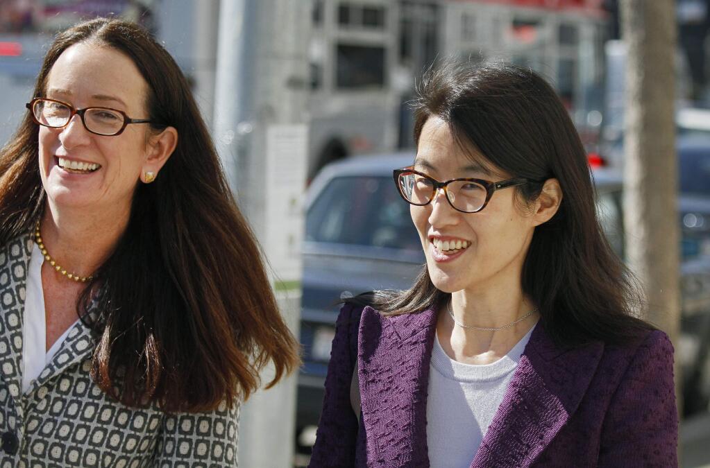 FILE - In this Feb. 24, 2015, file photo, Ellen Pao, right, leaves the Civic Center Courthouse along with her attorney, Therese Lawless, left, during a lunch break in her trial in San Francisco. (AP Photo/Eric Risberg, File)