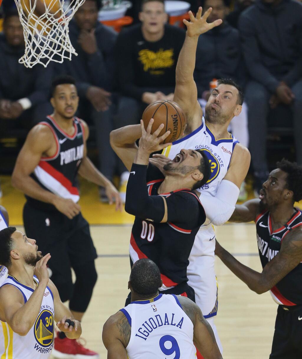 Golden State Warriors center Andrew Bogut defends against Portland Trail Blazers center Enes Kanter during game 1 of the NBA Western Conference Finals in Oakland on Tuesday, May 14, 2019. (Christopher Chung / The Press Democrat)