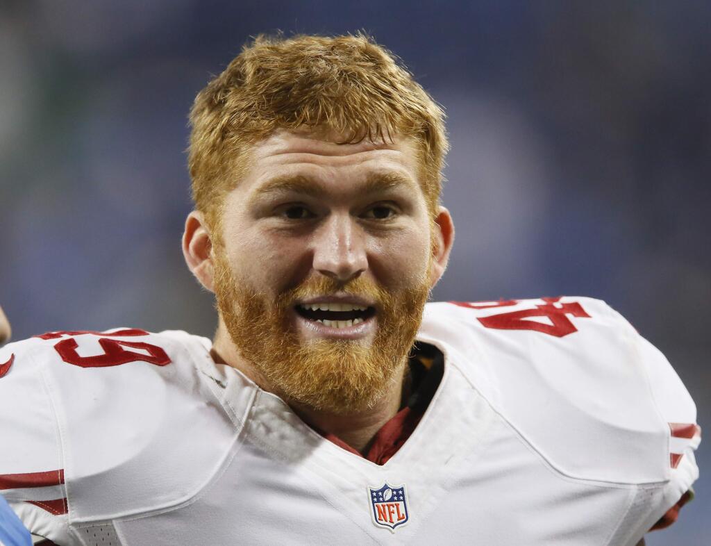 FILE - This Sunday, Dec. 27, 2015, file photo shows San Francisco 49ers fullback Bruce Miller (49) following an NFL football game against the Detroit Lions in Detroit. The San Francisco 49ers released Miller on Monday, Sept. 5, 2016, just hours after reports emerged he was arrested for assaulting two men. Miller was arrested in San Francisco after a fight at a hotel, citing unidentified people at the police department. The Niners initially said they were investigating the situation, then released Miller. (AP Photo/Duane Burleson,File)