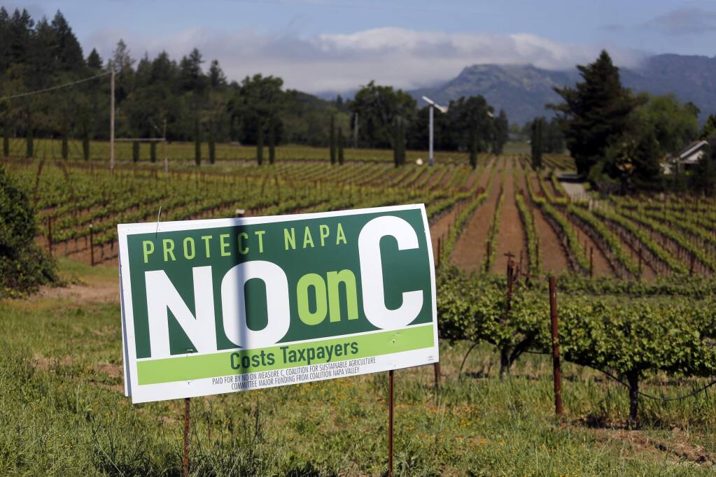 A sign opposes Measure C in Napa County. Photo taken on Thursday, May 3, 2018 in St. Helena, California . (BETH SCHLANKER/The Press Democrat)