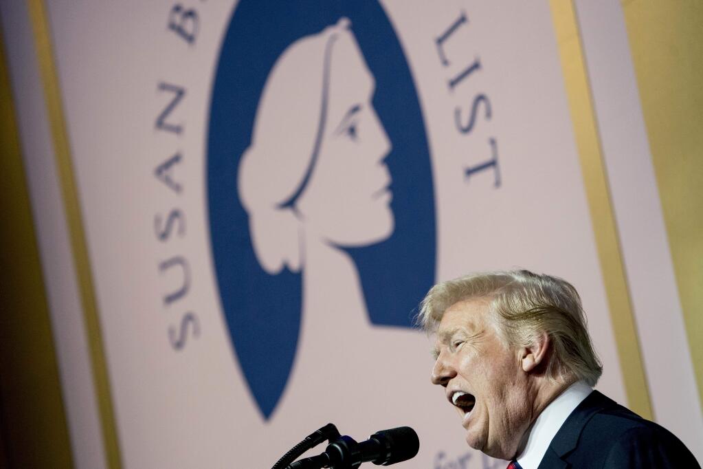 President Donald Trump announced new rules for family planning funds in a speech before the Susan B. Anthony List on Tuesday in Washington. (ANDREW HARNIK / Associated Press)