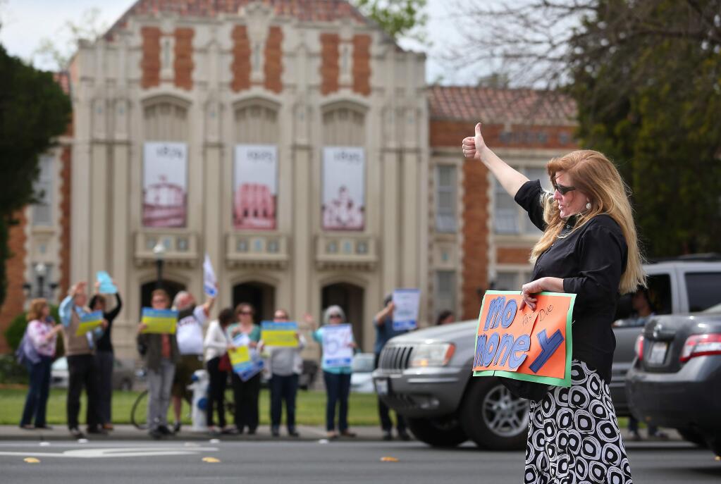Teachers demonstrate outside Santa Rosa High School during contract talks in 2015. The district and the teachers union reached a tentative agreement last week on a new contract that would last through the 2018-19 school year. (CHRISTOPHER CHUNG / The Press Democrat)