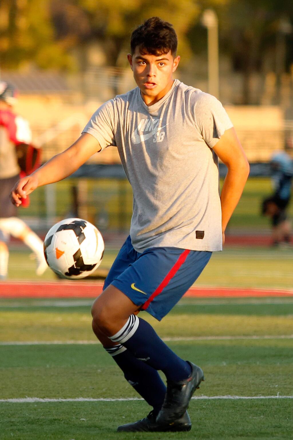 Rancho Cotate's Enrike Gomez controls the ball during Rancho Cotate High School boys varsity soccer practice, in Rohnert Park, California on Thursday, November 19, 2015. (Alvin Jornada / The Press Democrat)