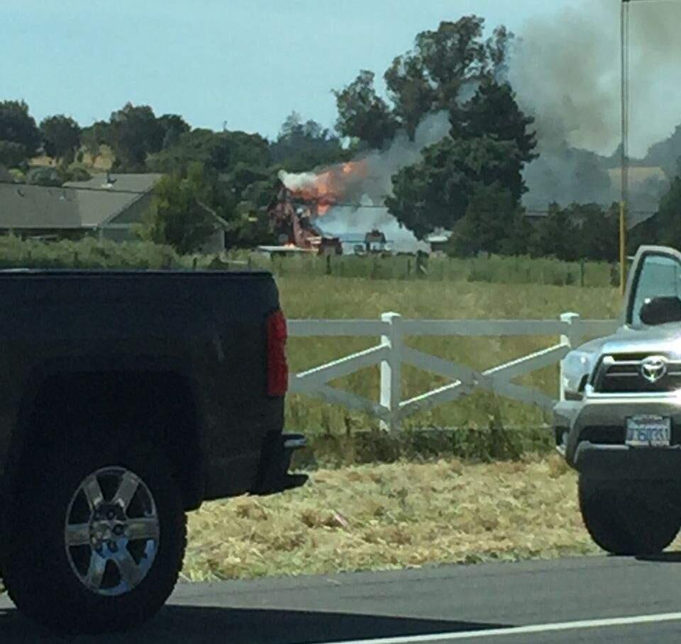 A barn fire on Highway 116 near Cotati, Monday, May 30, 2016.