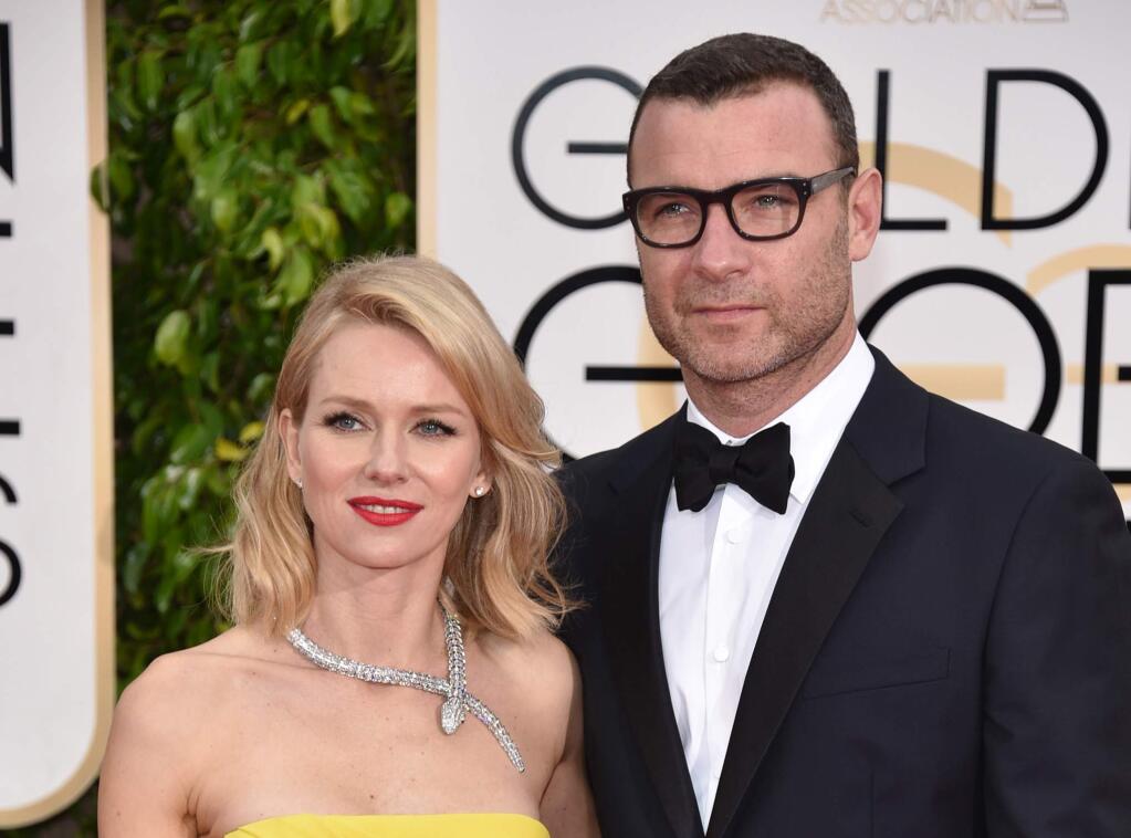 FILE - In this Jan. 11, 2015 file photo, Naomi Watts, left, and Liev Schreiber arrive at the 72nd annual Golden Globe Awards in Beverly Hills, Calif. The celebrity couple said in a joint statement Monday, Sept. 26, 2016, they are separating as a couple. Schreiber and Watts have been together since 2005 and have two children together. They are not married. (Photo by John Shearer/Invision/AP, File)
