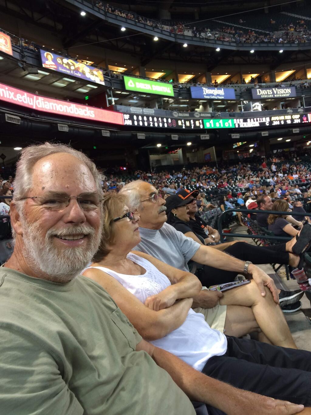 Mike Panas, left, at a baseball game. (Courtesy photo)