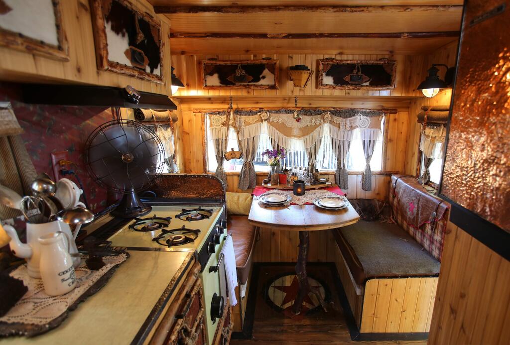 PHOTO BY CHRISTOPHER CHUNG/ THE PRESS DEMOCRATATTENTION TO DETAIL: The interior of Deborah and Glen Nichols' 1966 Aloha trailer has been done in the theme “Annie Oakley and Me.” The trailer is part of this weekend's “Tin Can Tourist” vintage trailer rally.