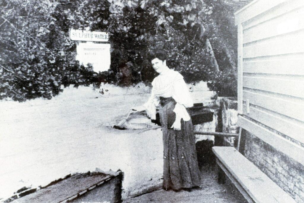 A Victorian woman samples the water from the hot sulphir spring. (Courtesy of Ellen Klages)